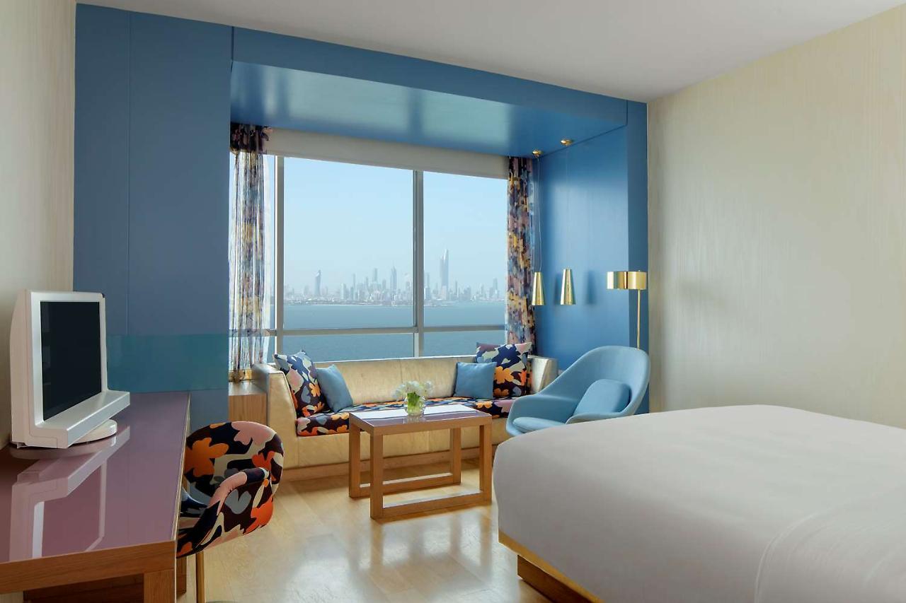 Symphony Style Hotel Kuwait Salmiya Esterno foto A room at the hotel