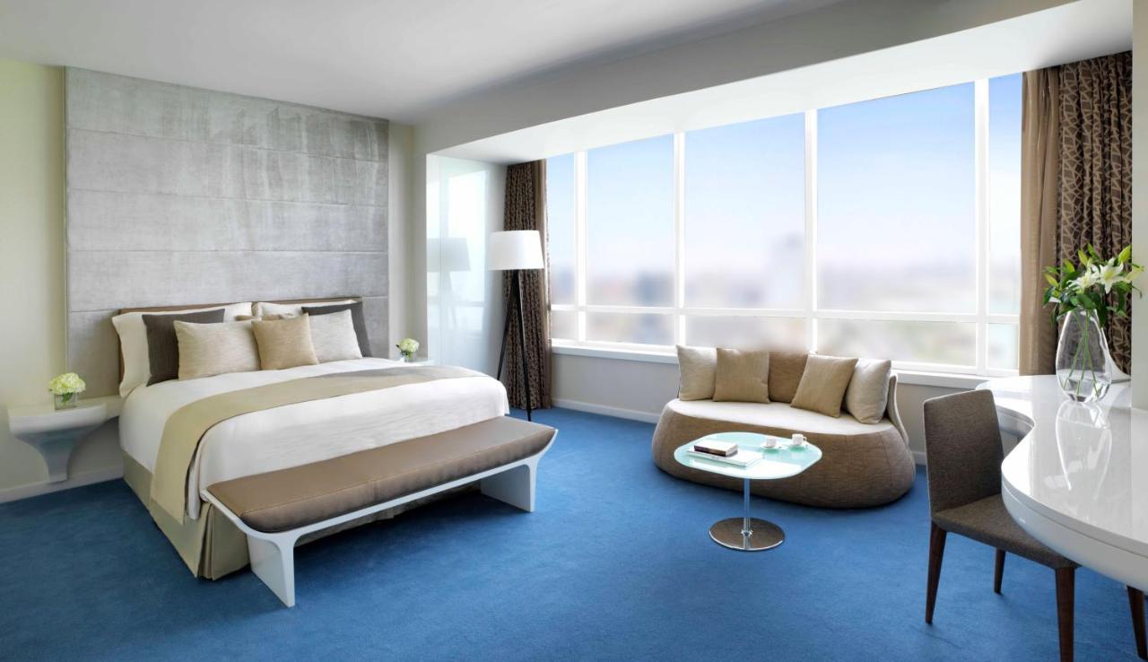 Symphony Style Hotel Kuwait Salmiya Esterno foto A bedroom at the hotel
