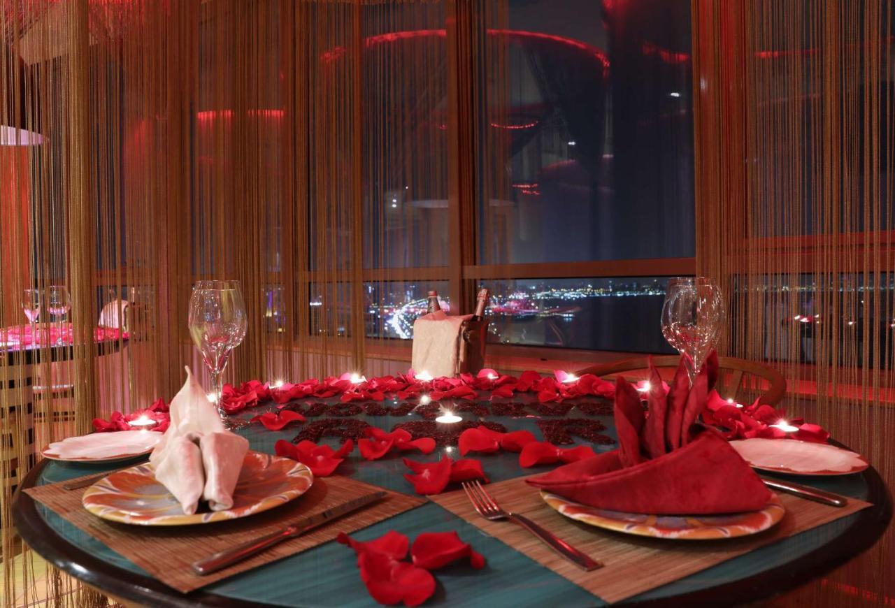 Symphony Style Hotel Kuwait Salmiya Esterno foto A table set for a romantic dinner